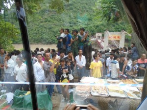 The Locals Checking Us Out, With the Re-Built Bridge in the Background